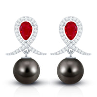 Vintage style Tahitian black pearl bridal earrings with rubies from Rosec Jewels, featuring elegant black pearls and sparkling rubies.