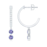 Minimal Tanzanite and Diamond Hoop Drop Earrings by Rosec Jewels featuring elegant gold hoops with tanzanite and diamond accents.