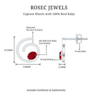 Oval cut ruby and diamond swirl stud earrings by Rosec Jewels, featuring a 1-carat oval ruby and sparkling diamonds.