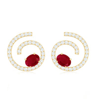 Oval cut ruby and diamond swirl stud earrings by Rosec Jewels featuring a 1 carat ruby and sparkling diamonds in a sleek design.