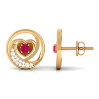 Round ruby and diamond heart stud earrings by Rosec Jewels featuring sparkling gemstones and a delicate heart shape.