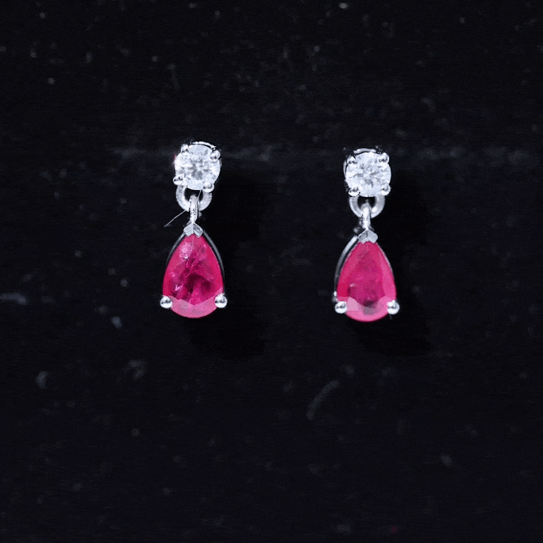 Natural ruby teardrop earrings with lab-grown diamond accents, elegant jewelry from Rosec Jewels featuring gold-toned design.