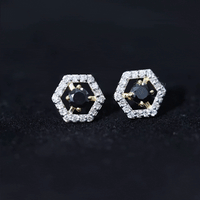 Black spinel and diamond hexagon stud earrings by Rosec Jewels featuring 0.9 carats of sparkling gemstones.