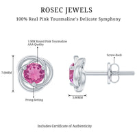 Pink tourmaline solitaire swirl stud earrings by Rosec Jewels featuring 0.9 carats of vibrant pink gemstones.