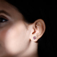 Rosec Jewels 0.9 carat pink tourmaline swirl stud earrings with a simple, elegant design on a white background.