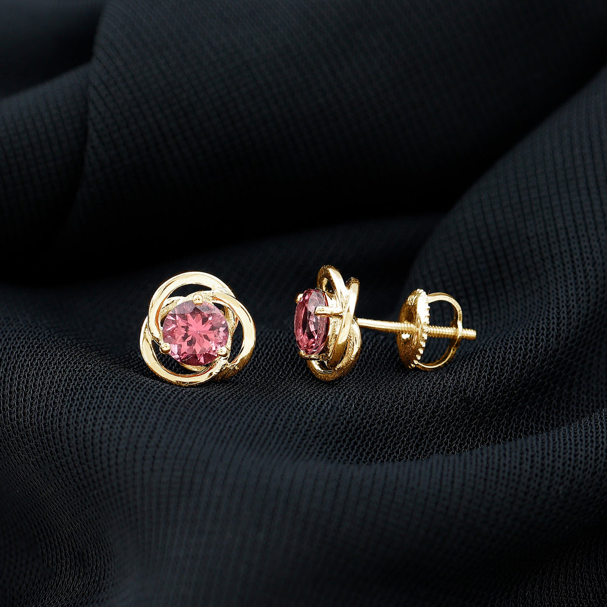Rosec Jewels 0.9 Carat pink tourmaline swirl stud earrings, showcasing elegant gemstone design and sterling silver setting.