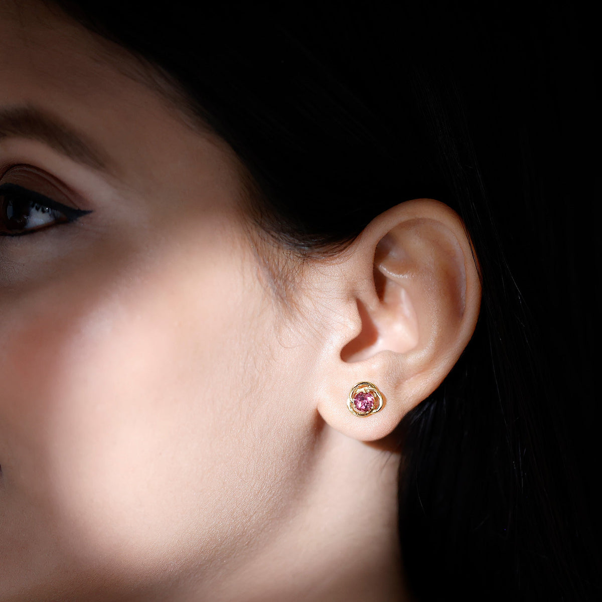 Pink tourmaline swirl stud earrings with 0.9 carat solitaire design by Rosec Jewels, showcasing elegant gemstone details.