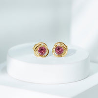 Pink tourmaline swirl stud earrings by Rosec Jewels featuring 0.9 carat solitaire gemstones in a delicate design.