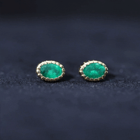 0.8 Carat Oval Emerald Solitaire Stud Earrings in Bezel Setting