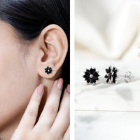 Marquise shape black onyx floral statement stud earrings by Rosec Jewels with intricate design and gold-tone accents.