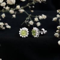 Rosec Jewels 1 Carat Peridot stud earrings with diamond halo, showcasing vibrant green peridot gemstones and sparkling diamond accents.