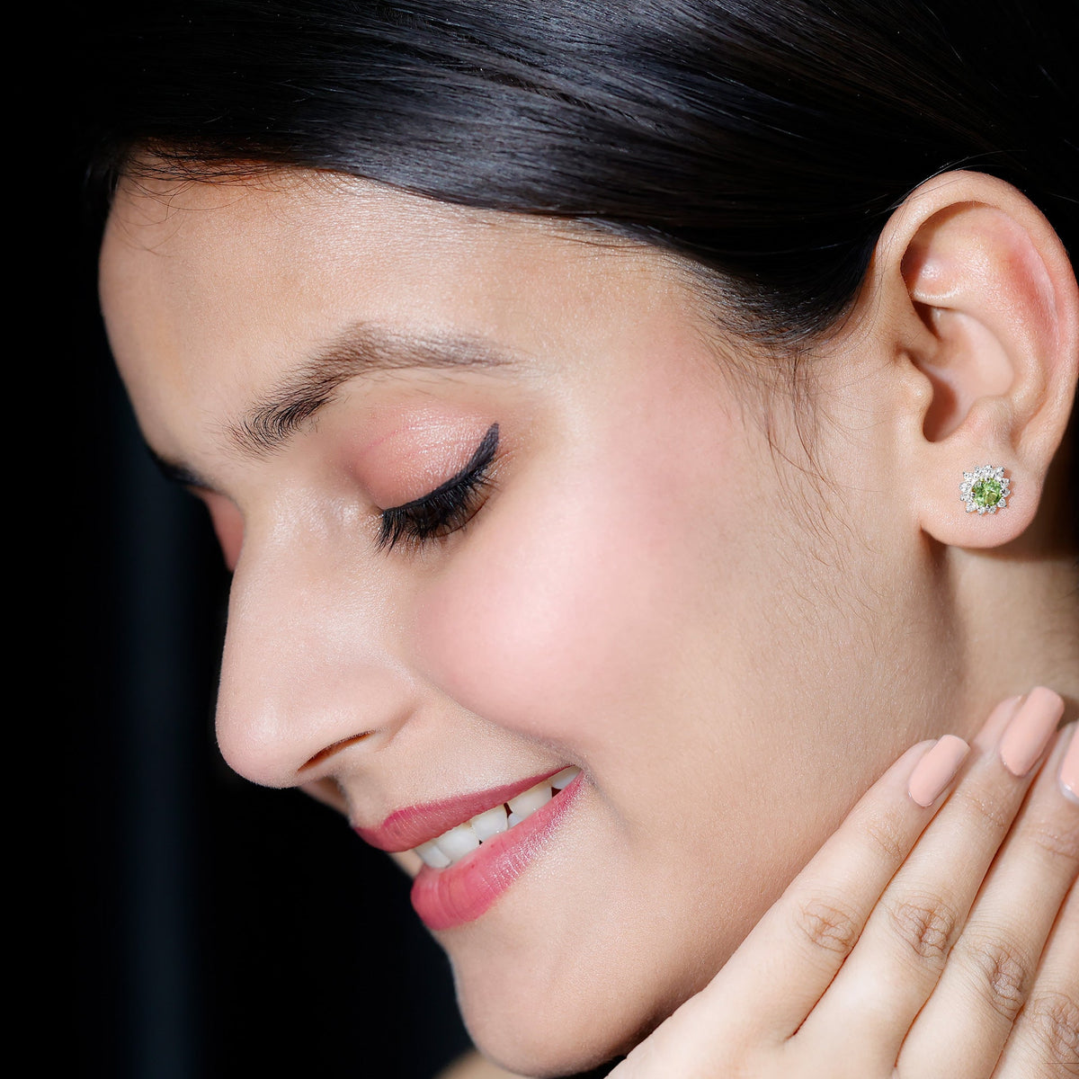 Rosec Jewels 1 Carat Peridot stud earrings with diamond halo, showcasing vibrant green peridot stones and sparkling diamond accents.