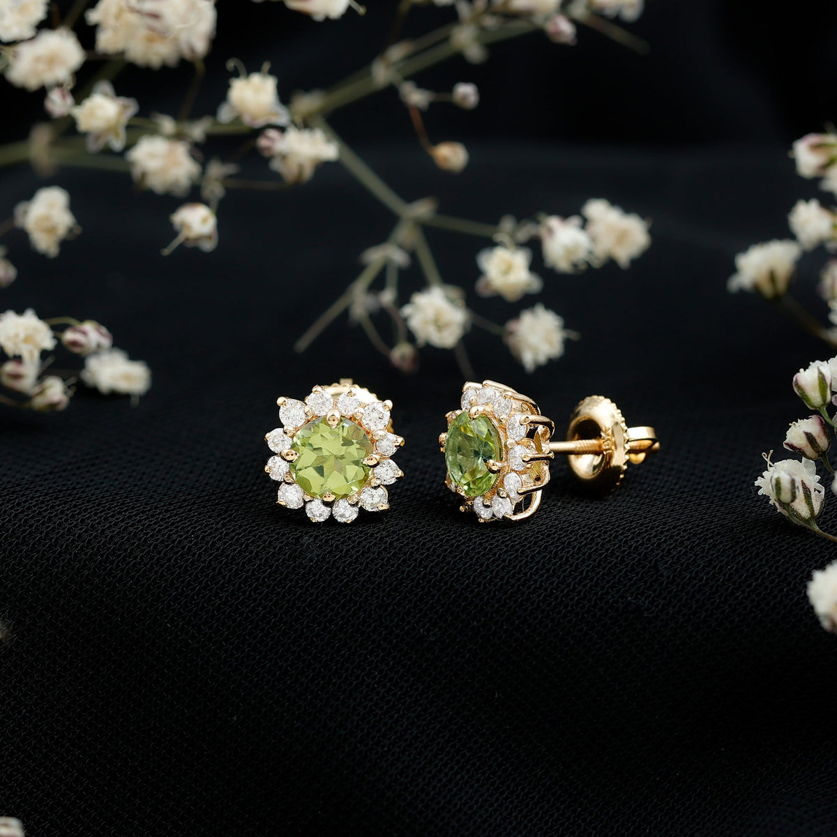 Rosec Jewels 1 Carat Peridot stud earrings with diamond halo, featuring vibrant green gemstones and sparkling diamond accents.