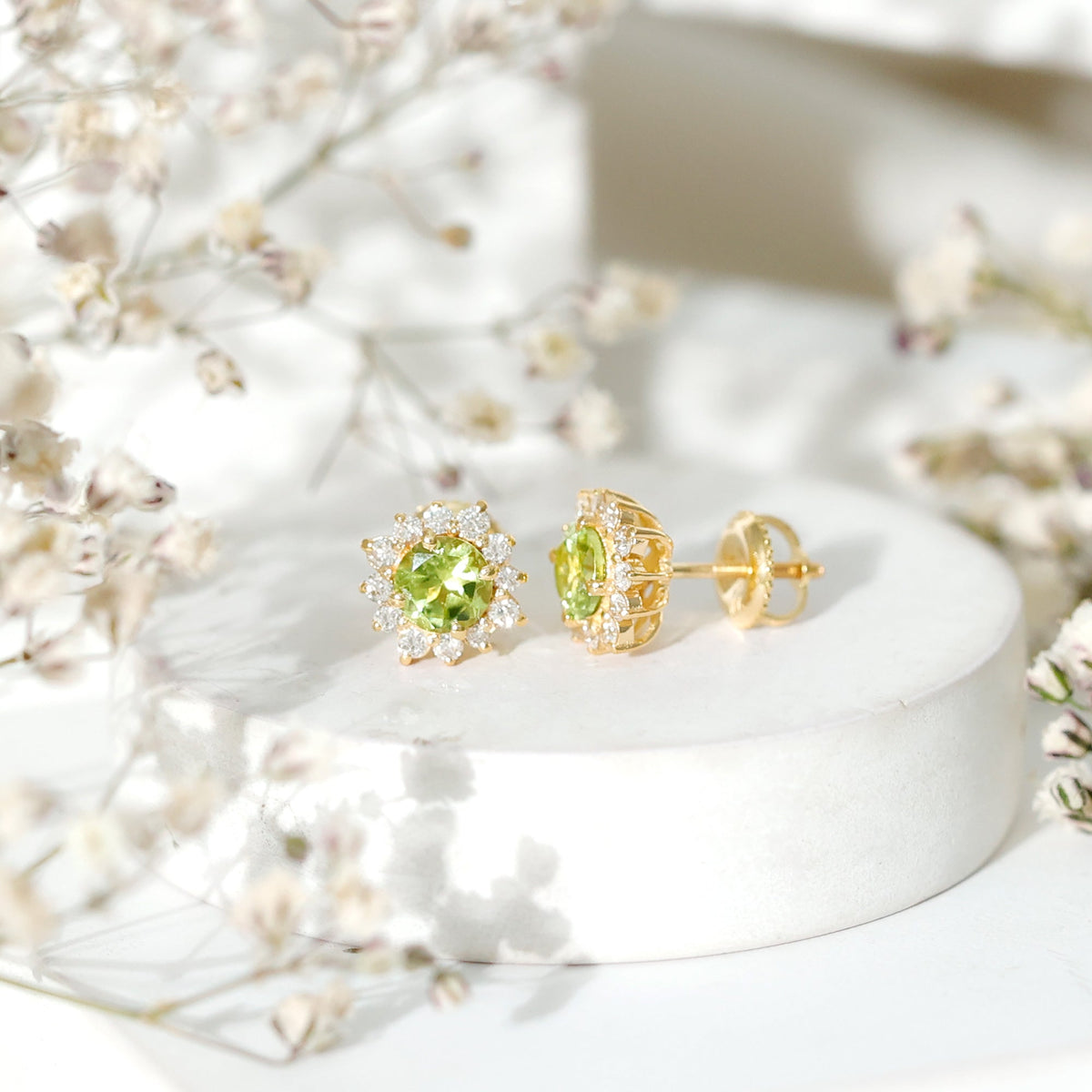 Rosec Jewels 1 Carat Peridot stud earrings with diamond halo, featuring vibrant green peridot gemstones and sparkling diamond accents.
