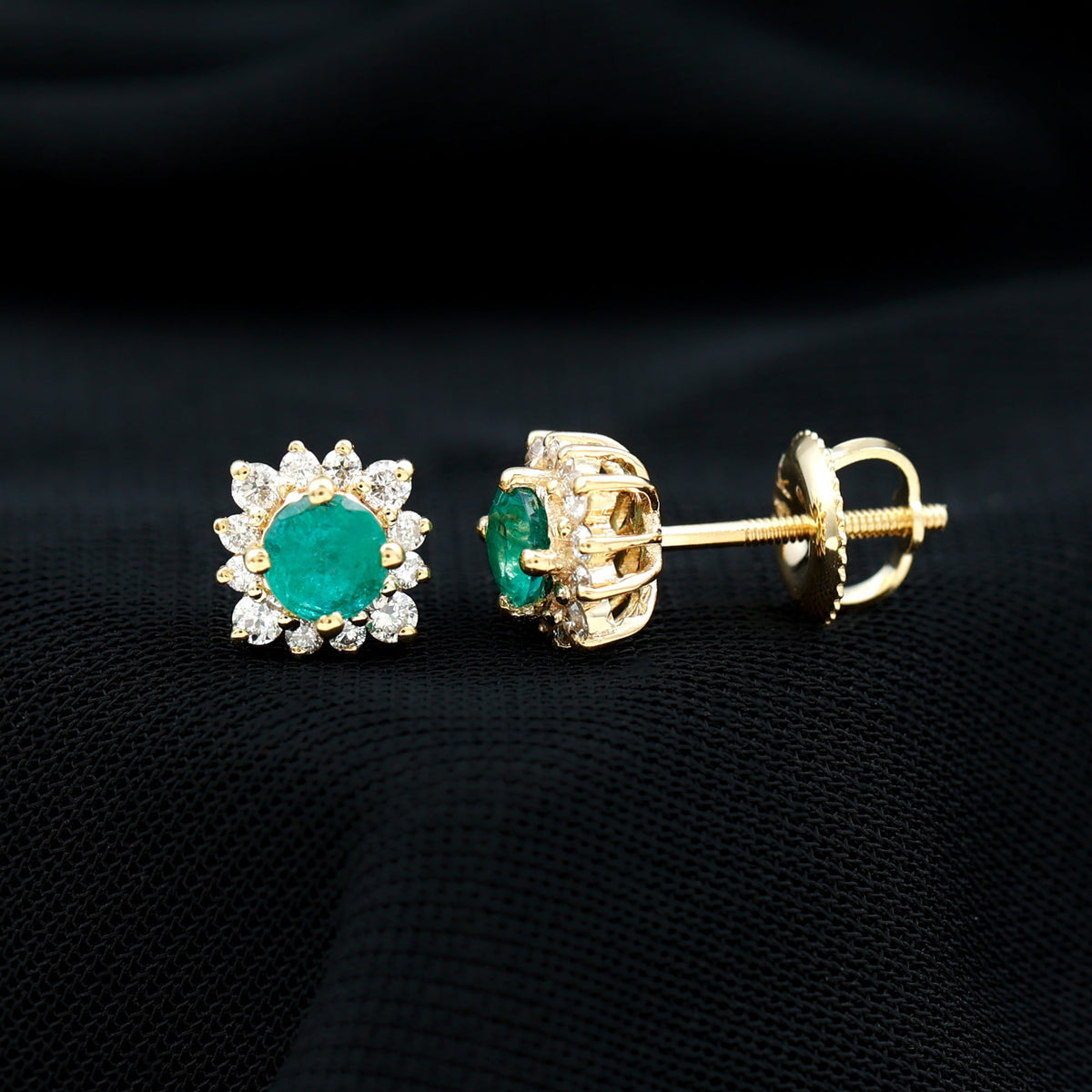 Real emerald stud earrings with diamond halo from Rosec Jewels, showcasing sparkling gemstones and elegant jewelry design.