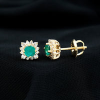 Real emerald stud earrings with diamond halo from Rosec Jewels, showcasing sparkling gemstones and elegant jewelry design.