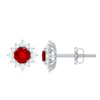 Rosec Jewels 1.25 CT created ruby stud earrings with diamond halo, featuring classic earring design and sparkling gemstone accents.