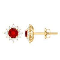 Created ruby stud earrings with diamond halo, 1.25 carats, by Rosec Jewels, featuring classic design and sparkling gemstone accents.