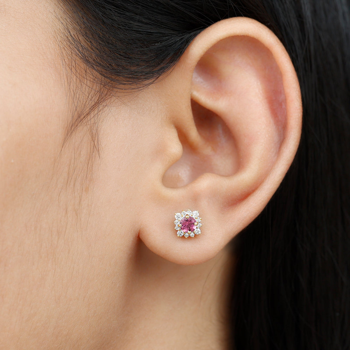 Round pink tourmaline stud earrings with diamond halo from Rosec Jewels, featuring sparkling pink gemstones and a elegant design.