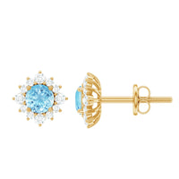 Real aquamarine stud earrings with diamond halo from Rosec Jewels, showcasing sparkling blue gemstones and elegant design.
