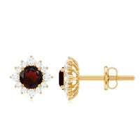 0.6 Carat garnet stud earrings with diamond halo by Rosec Jewels, showcasing red gemstone surrounded by sparkling diamonds.