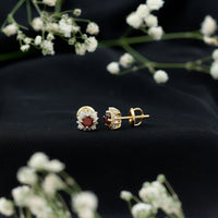Rosec Jewels 0.6 Carat Garnet stud earrings with diamond halo, showcasing elegant red garnet gemstones and sparkling diamond accents.