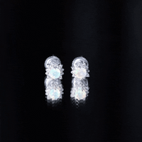 Yellow Ethiopian opal stud earrings with diamond halo, featuring Rosec Jewels' elegant jewelry design