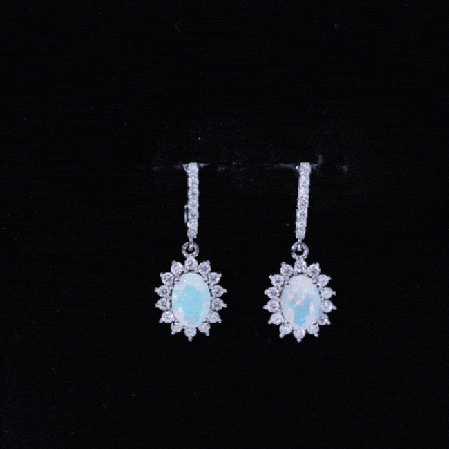 Ethiopian opal drop earrings with 1.8 carats from Rosec Jewels, featuring oval-shaped, sparkling gemstone dangles with certificate