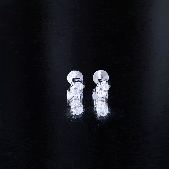 Yellow lab-grown diamond oval-shaped solitaire stud earrings from Rosec Jewels with 4x6 mm stones.