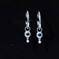 Rosec Jewels bezel set London Blue Topaz and lab diamond hoop drop earrings, showcasing elegant jewelry with blue gemstones and sparkling accents.