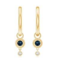 Bezel set London Blue Topaz and lab diamond hoop drop earrings by Rosec Jewels featuring blue gemstone and sparkling diamonds.
