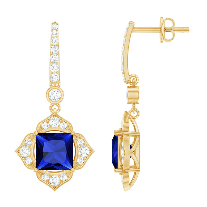 Lab grown blue sapphire floral drop earrings with diamonds by Rosec Jewels, featuring intricate floral design and sparkling gemstones.