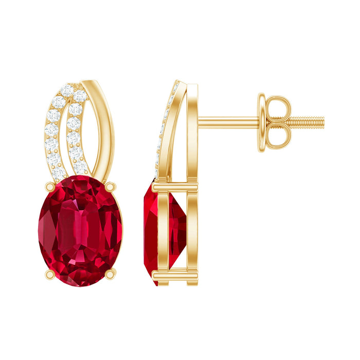 Oval lab-created ruby stud earrings with diamond accents from Rosec Jewels, showcasing sparkling gemstones and elegant design.