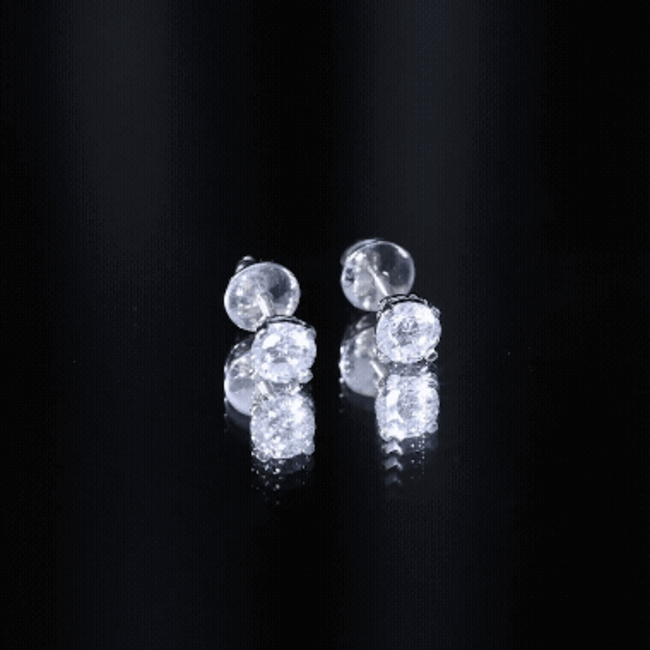 Certified one carat cubic zirconia solitaire stud earrings in silver, featuring a sparkling white gem from Rosec Jewels.