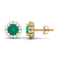 Real 0.99 carat emerald and diamond halo stud earrings by Rosec Jewels, featuring vibrant emeralds surrounded by sparkling diamonds.