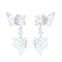 Heart-shaped 3 carat moissanite drop earrings with butterfly backs, elegant jewelry from Rosec Jewels.