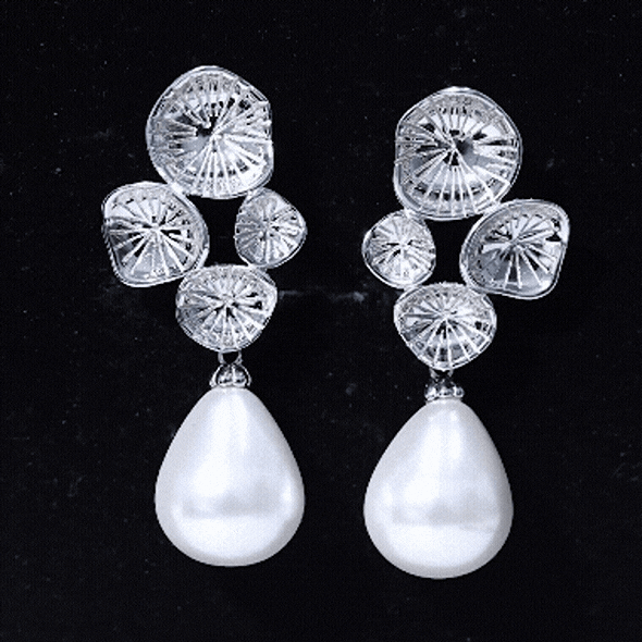 Freshwater cultured pearl dangling earrings in silver, featuring 24 carats of elegant pearls from Rosec Jewels.