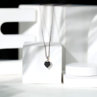 Black Onyx solitaire pendant in heart shape with 2-carat weight from Rosec Jewels, featuring a sleek, polished design.