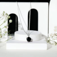 Black onyx heart-shaped solitaire pendant with a 2 carat gemstone, elegant jewelry piece by Rosec Jewels.