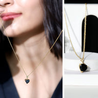 Black onyx heart-shaped solitaire pendant by Rosec Jewels featuring a 2 CT gemstone on a sleek pendant setting.