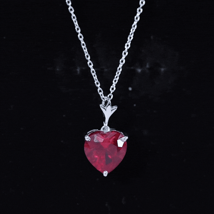 Yellow gold 3.5 carat lab-grown ruby solitaire heart pendant by Rosec Jewels, featuring a sparkling heart-shaped ruby centerpiece.