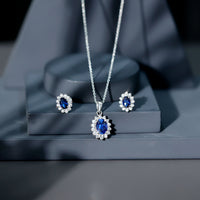 Oval Shaped Lab Created Blue Sapphire Necklace and Earrings Set with Moissanite Halo