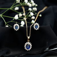 Oval Shaped Lab Created Blue Sapphire Necklace and Earrings Set with Moissanite Halo