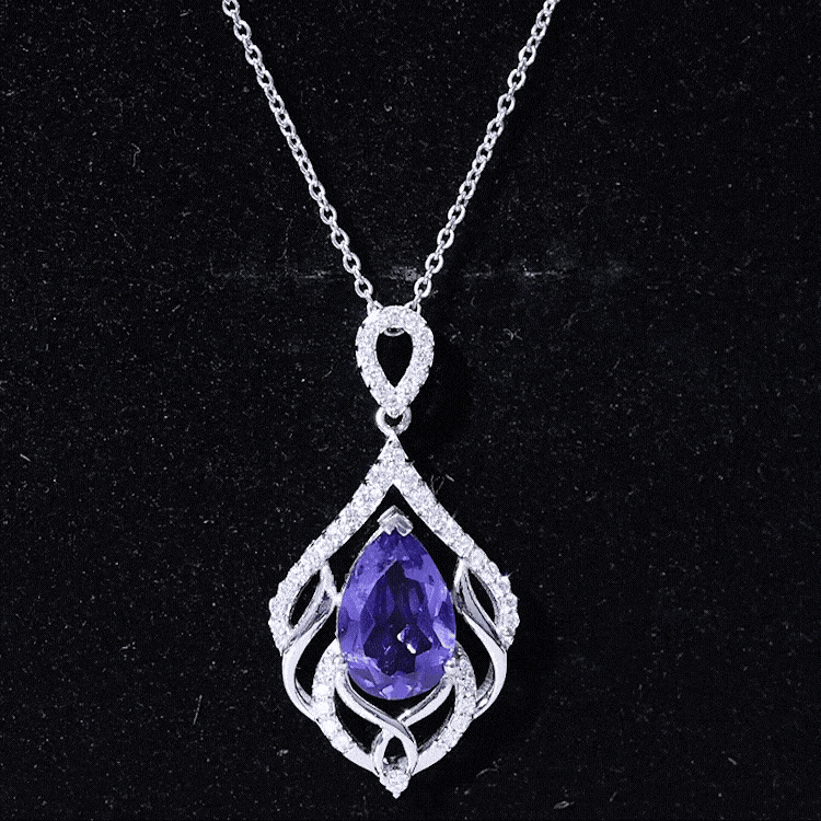 Lab grown blue sapphire and diamond pendant bridal necklace by Rosec Jewels featuring a yellow gold setting.