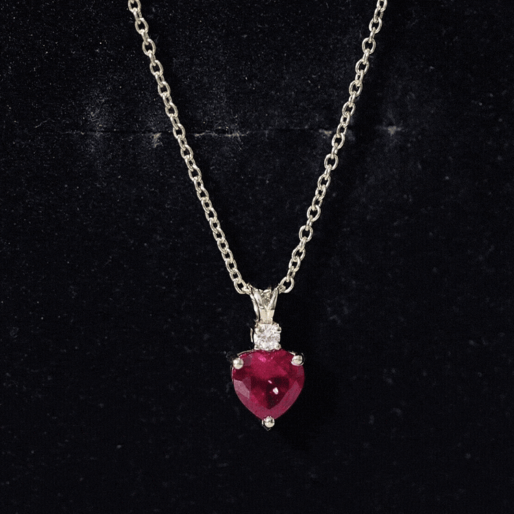 Yellow gold lab grown ruby heart pendant with diamond accent, 0.9 carats, from Rosec Jewels, elegant jewelry pendant.