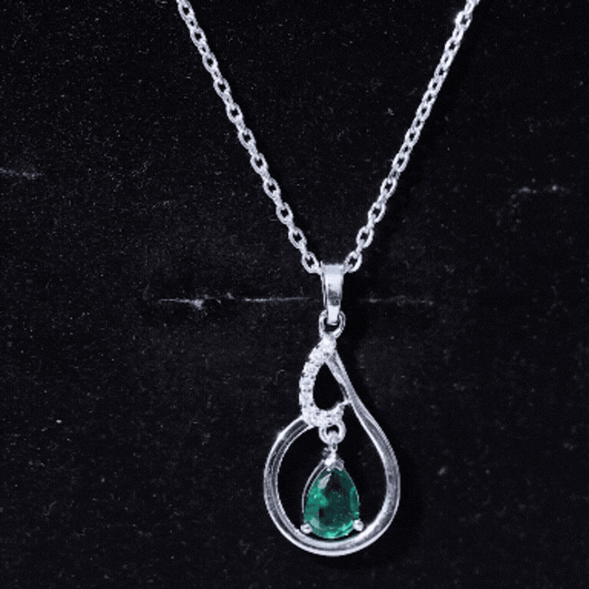 Lab grown 0.7 carat emerald teardrop pendant with chain, rose gold setting, from Rosec Jewels, jewelry pendant with vibrant green gemstone.