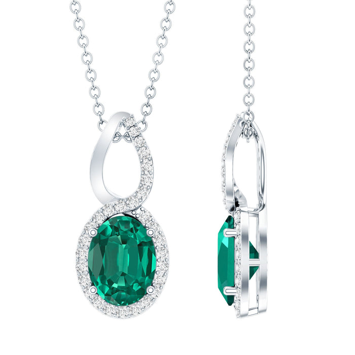 Oval lab-grown emerald infinity pendant on silver chain, 1.2 carats, elegant jewelry by Rosec Jewels.