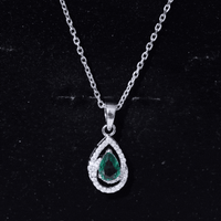Sterling Silver 0.7 Carat Lab Grown Emerald Teardrop Pendant Necklace with Moissanite
