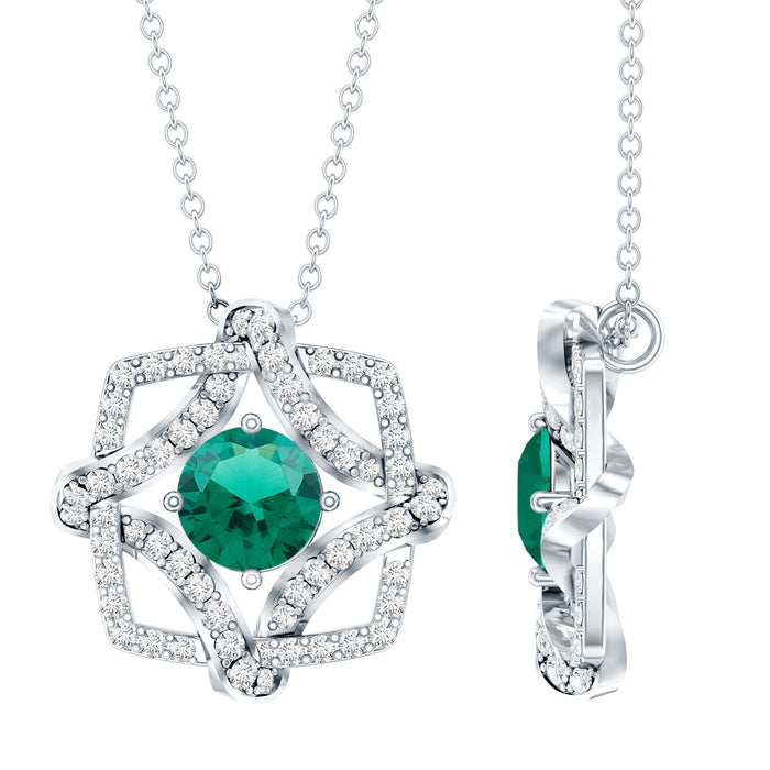Lab grown emerald interlock pendant necklace with silver chain, featuring a 0.8 carat emerald gemstone and intricate design.