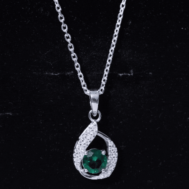 Lab grown emerald drop pendant necklace with 0.8 carat emerald and silver chain by Rosec Jewels, elegant jewelry accessory.